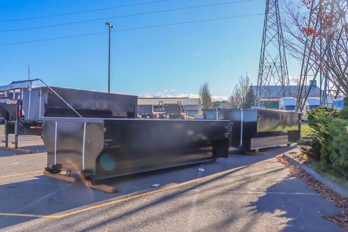 Roll-off dumpster ready for waste disposal at job site for 15 Yard Dumpster Rental in Addison